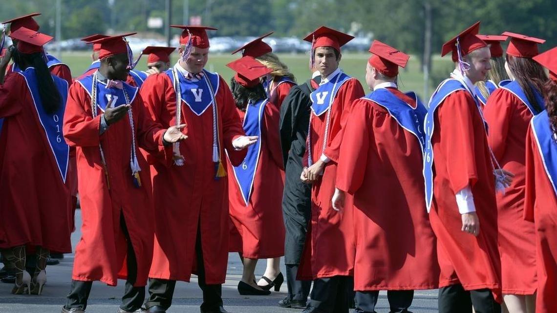 Veterans High School grads keep loose by dancing as they wait to head into their commencement ceremonies last year. The school was named one of the nation’s top high school in a report by the U.S. News & World Report.