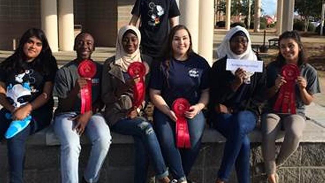 From left, Yolanda Morin, James Stephens, Masona Fofana, Jewel Blount, Fatimah Fofana, Alexis Monroy and Kayla White participated in events at the Georgia National Fairgrounds as part of the school’s Family, Career and Community Leaders of America team.