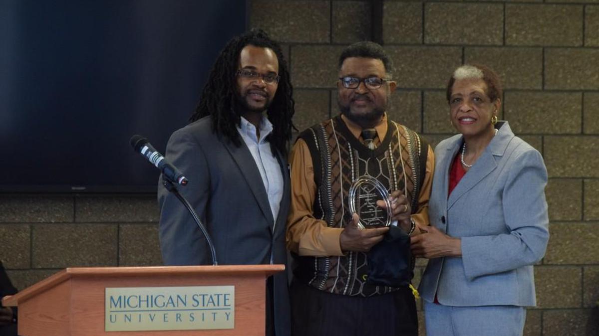 From left, Stratton Lee III, vice president of Michigan State University’s Black Faculty, Staff and Administrators Association; Charles Roberts, recipient of the Historical Leader Award; and Eunice Foster, president of Michigan State University’s Black Faculty, Staff and Administrators Association, are pictured on April 11 during an awards ceremony at Michigan State.