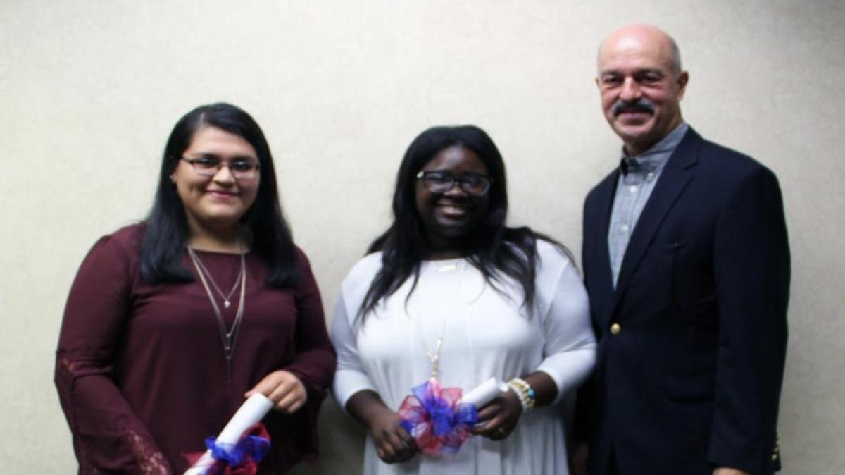 Naomi Neria and Aisis Hull are pictured with Don Faulk. The students received 2017 Don Faulk Teen Volunteer Scholarships from Navicent Health.