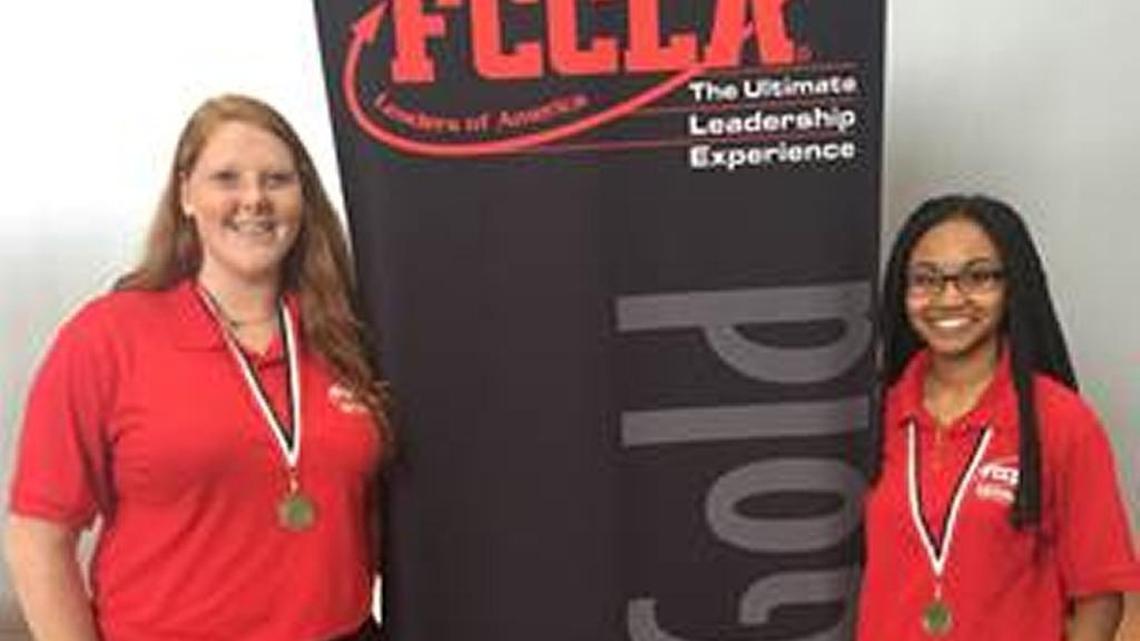 Northside High School's Megan Joyner and La'shadia Jimenez won a Gold medal for their Chapter in Review Display at an FCCLA national conference this summer.