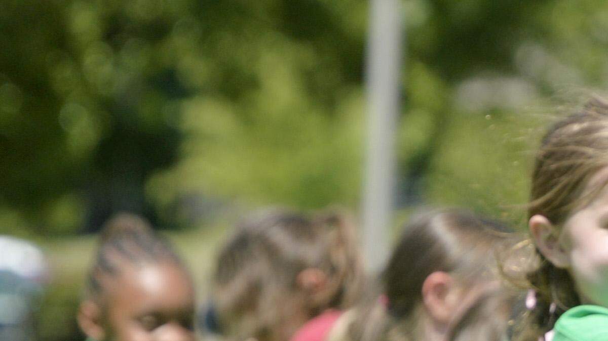 05/07/2014:.Students in Kristin Frazier's Alexander II 1st grade class compete in a tug-of-war during the school's Field Day at Tattnall Square Park May 7, 2014.