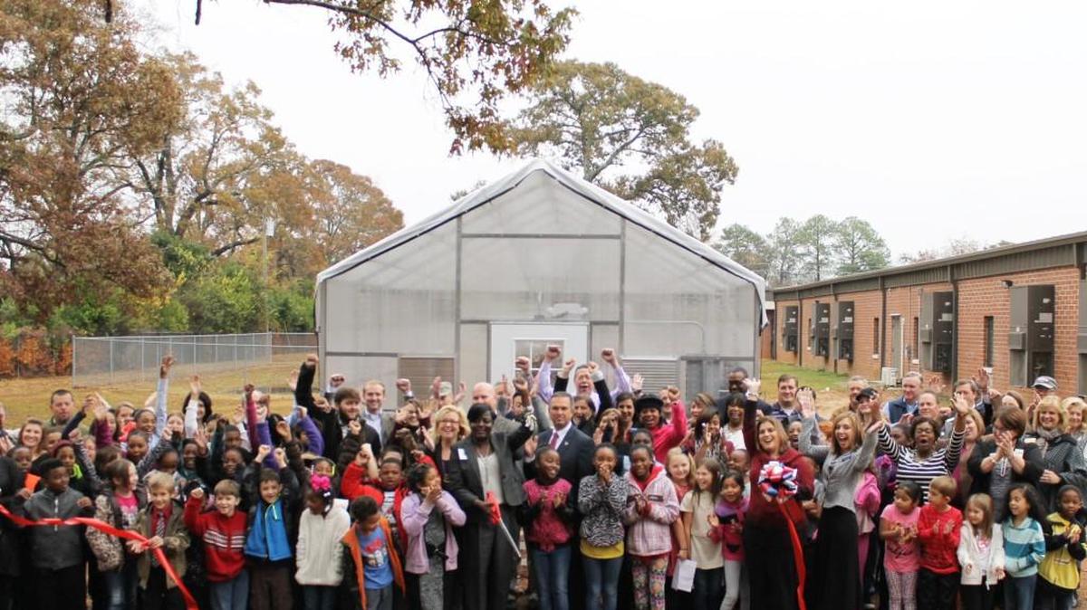 The Leadership Class from Robins Regional Chamber helped get a greenhouse and outdoor classroom built at Westside Elementary School. Here, staff, faculty and Leadership Class members are pictured at the ribbon-cutting Dec. 5, 2016.