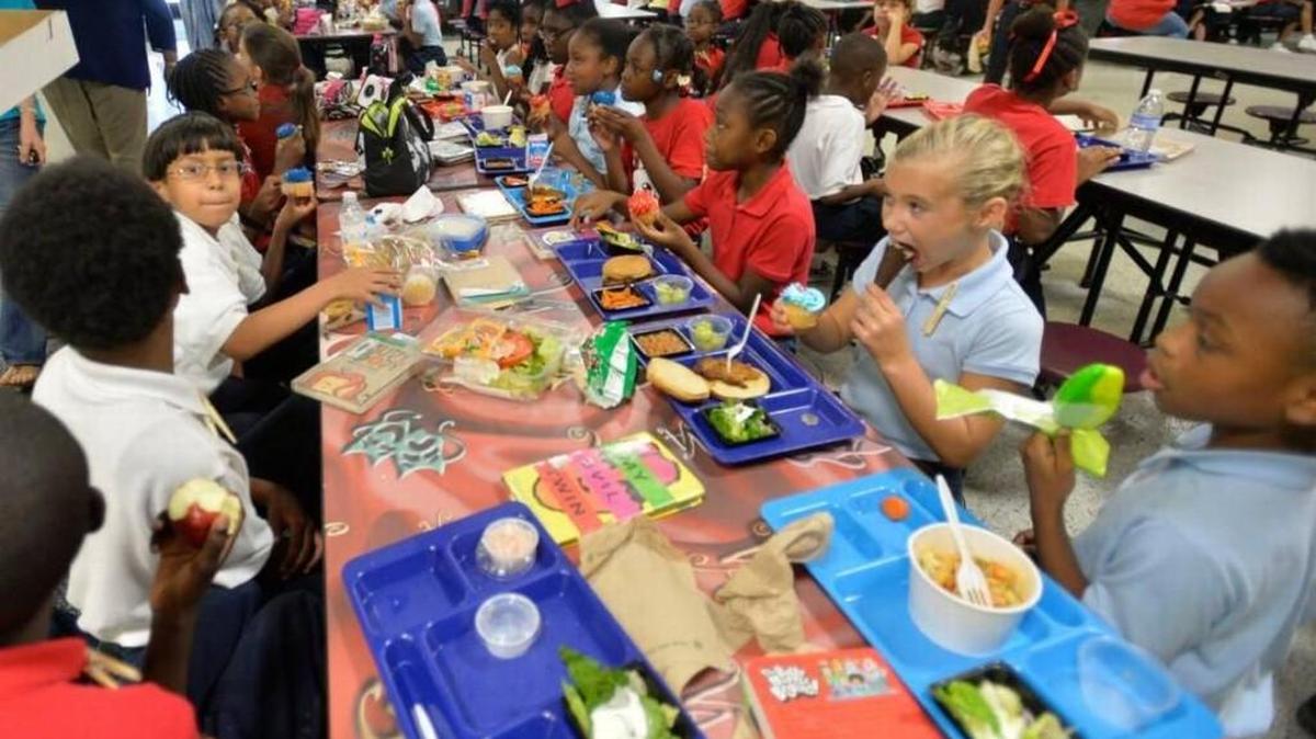 Vineville Academy fourth-graders enjoy lunch.