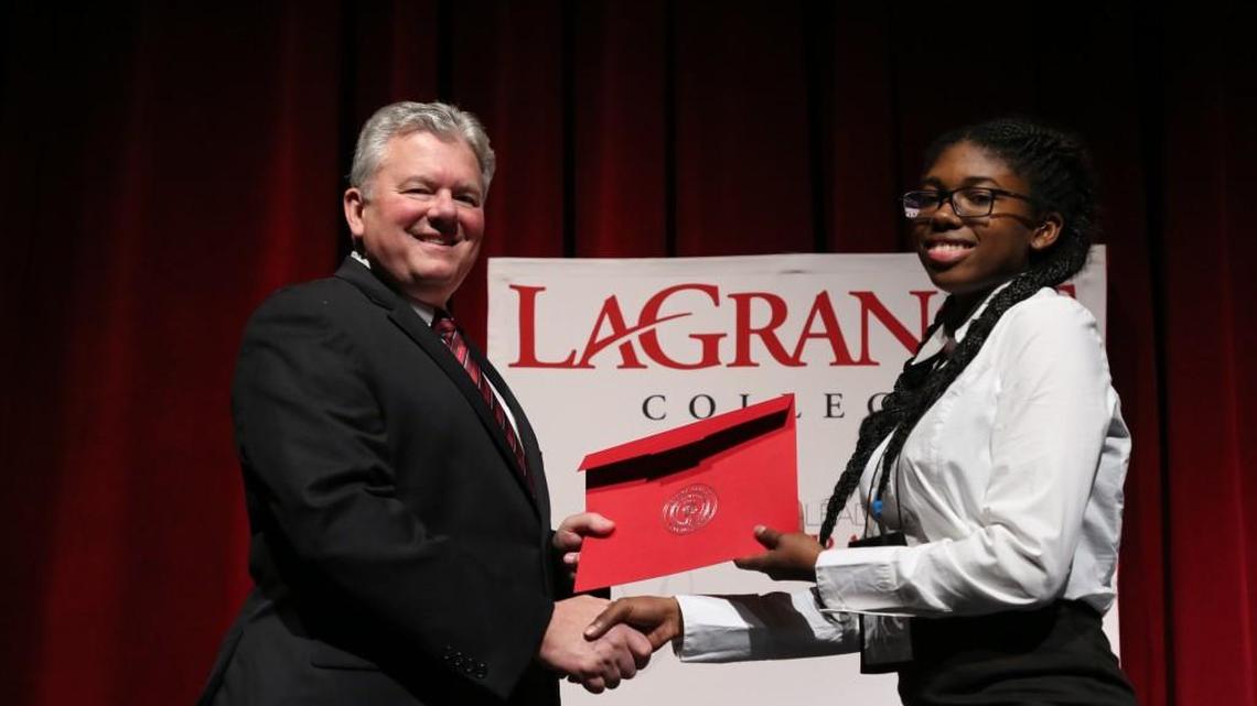 Alexis Simmons, a Northside High School graduate, was chosen for LaGrange College’s Presidential Scholarship weekend program and received a $1,000 award. She’s pictured here with college President Dan McAlexander.