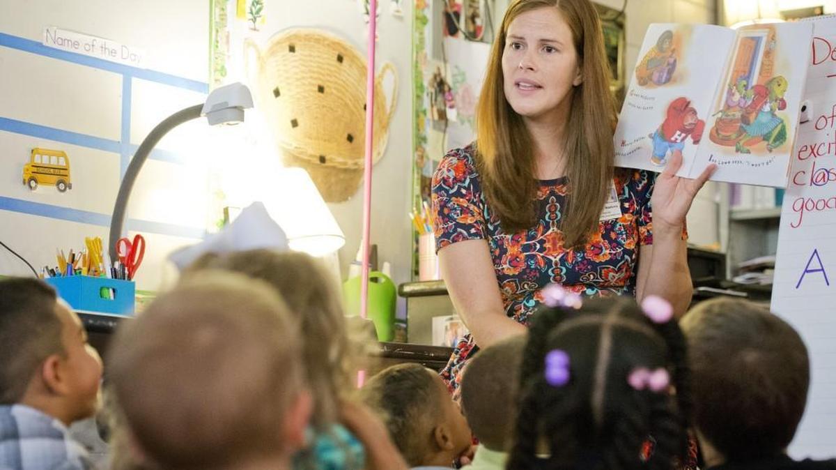 Shirley Hills Elementary School kindergarten teacher Ashley Watkins reads a book to her students Friday morning. Watkins was recently named Houston County Teacher of the Year.