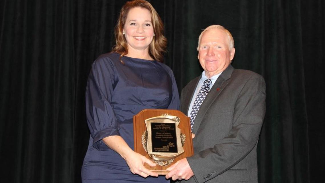 Northside Elementary School music teacher Marla Garnto has been named the 2016 Georgia Agriculture in the Classroom Teacher of the Year by the Georgia Farm Bureau. She is pictured here with Gerald Long, president of the Georgia Farm Bureau.