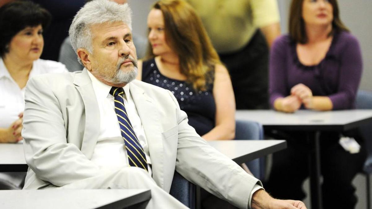 Surveyor Terry Scarborough waits for a news conference to begin Aug. 23, 2011, at the Secretary of State's office in Macon.