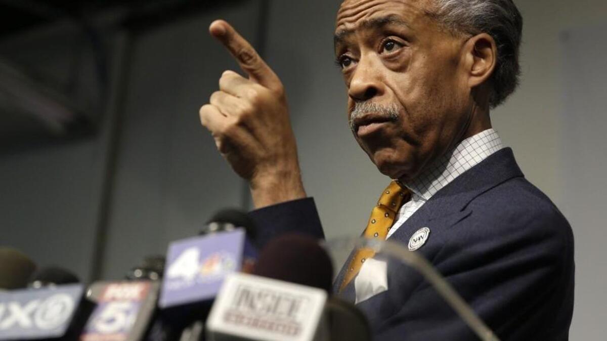 Rev. Al Sharpton speaks during a news conference in New York, Tuesday, April 8, 2014. Sharpton says a report that he spied on New York Mafia figures for the FBI in the 1980s is old news.
