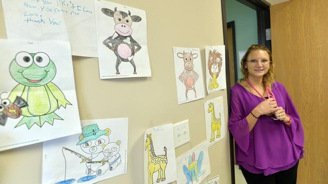 Margo Gaskins, a certified pediatric nurse practitioner, says students at Ingram-Pye Elementary School provide the art she displays on the walls of her office, and they often come with a thank you. Gaskins left the First Choice Primary Care facility adjacent to the school at the end of the year to take a similar role in Macon County.