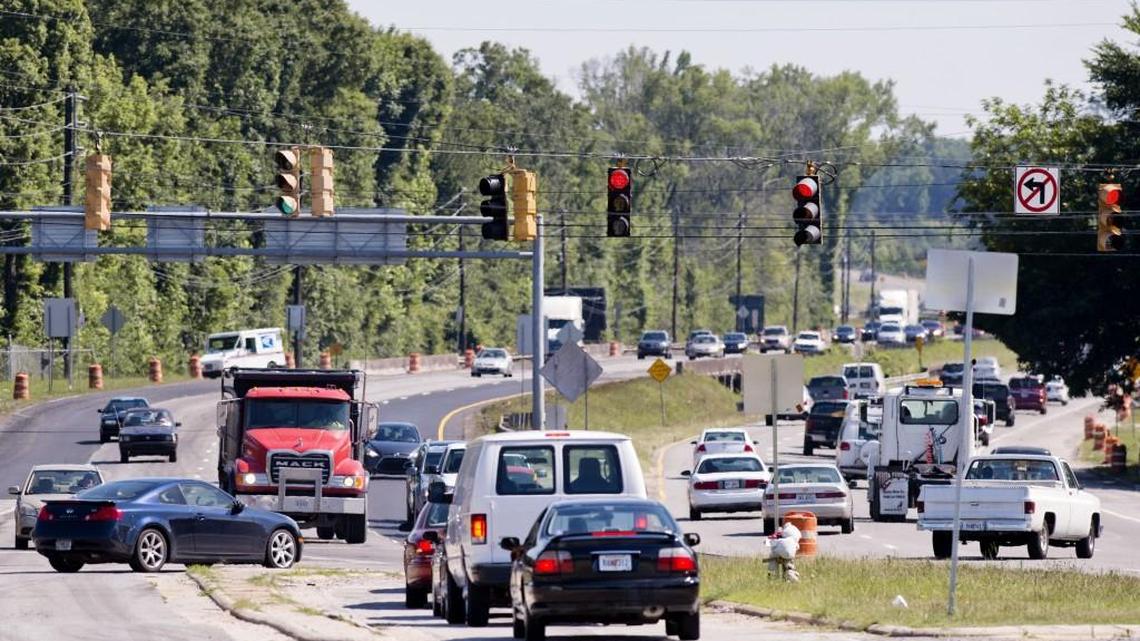 Traffic waits on Houston Avenue while automobiles turn onto Ga. 247 from Broadway in this June 9, 2016, file photo. The Georgia Department of Transportation is looking at putting in a roundabout at the intersection known as Seven Bridges.