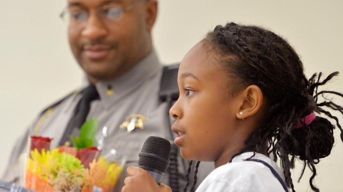 The Bibb County Sheriff’s Office is offering free camps in June for ages 9 - 13 through the CHAMPS program, which stands for Choosing Healthy Activities and Methods Promoting Safety. In this 2014 file photo, Madison Spells reads her winning essay at a CHAMPS graduation.
