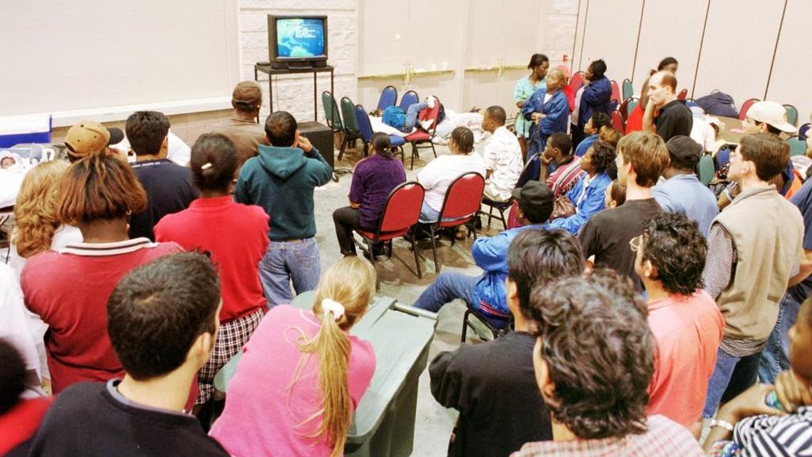Hurricane Floyd evacuees at Macon’s Wilson Convention Centre watched the Weather Channel as the storm rolled up the East Coast in September 1999.