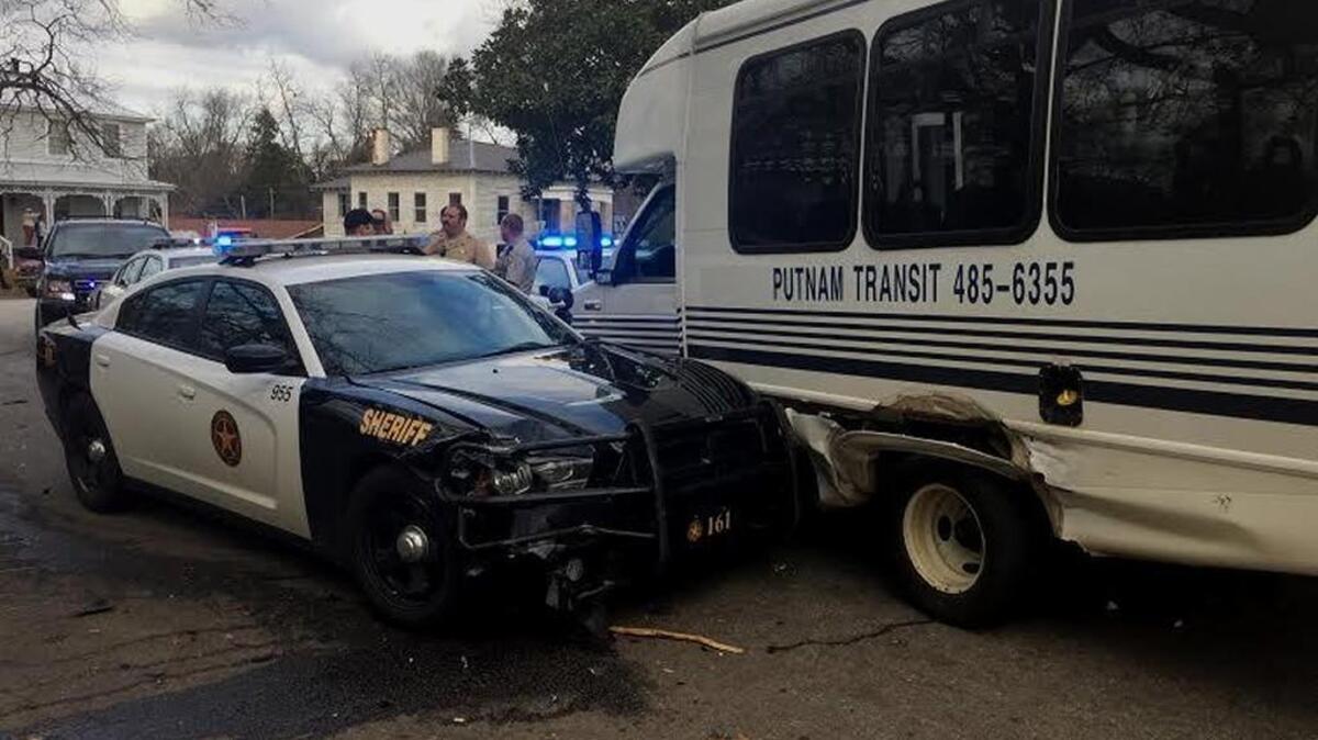 A Putnam County Transit bus was rammed to a stop Friday after a high-speed chase into the town of Sparta.