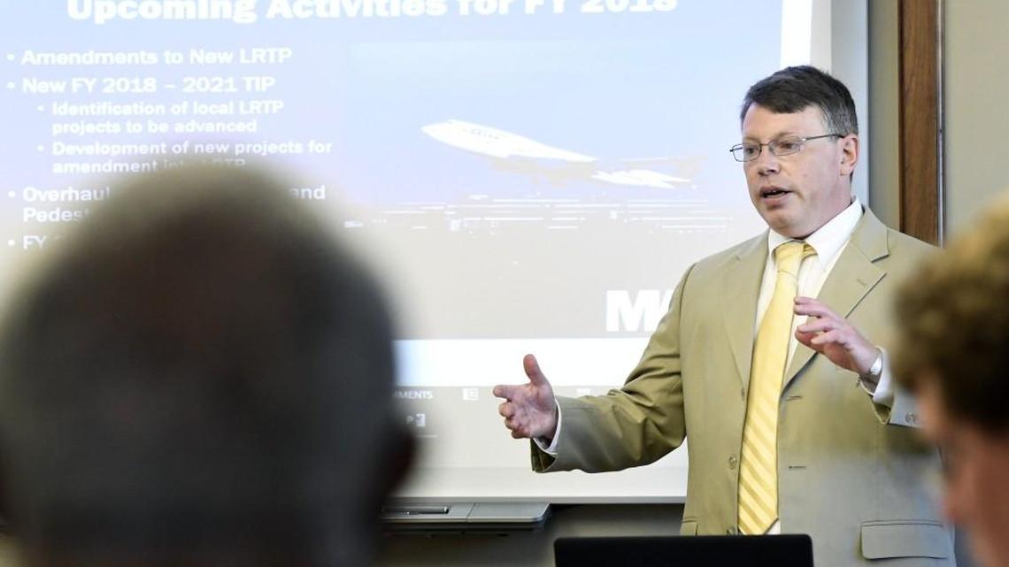 Mike Greenwald, planning director for the Macon-Bibb County Planning and Zoning Commission speaks during Wednesday’s Macon Area Transportation Study Policy Committee meeting. The committee approved an updated long range transportation plan.