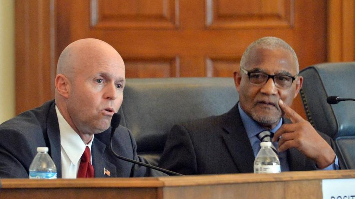 Bibb County tax commissioner candidates Wade McCord, left, and C. Jack Ellis make their pitches during a Democratic Party forum Thursday at the Macon-Bibb County Government Center.