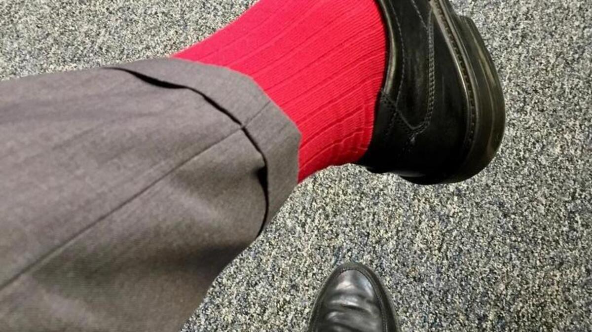 Red is Ed Grisamore favorite color, all the way down to his socks.