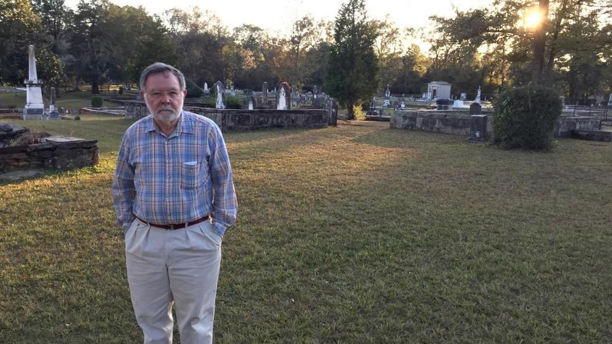 Ralph Bass stands in the historic area of Forsyth City Cemetery, where Only Patience Outlaw Anderson is believed to have been buried in 1864.​