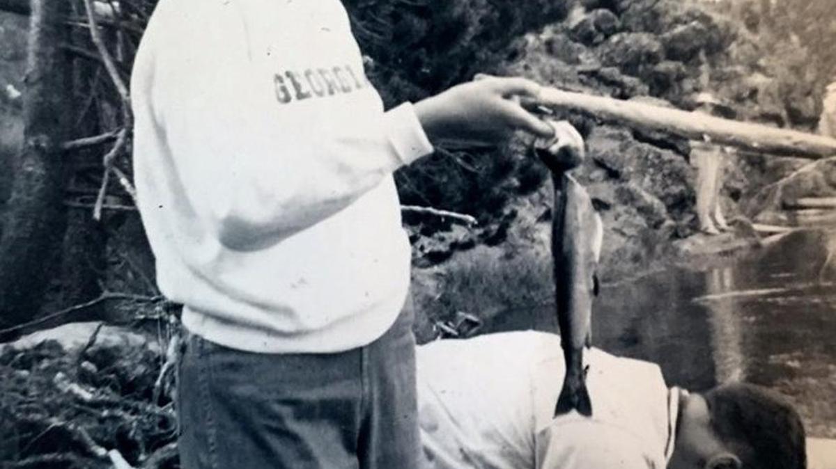Harriet Comer shows a fish that was caught during the summer she worked at Yellow Stone National Park.