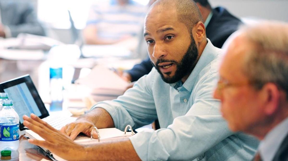 Macon-Bibb County Commissioner Virgil Watkins addresses the other commissioners during a budget meeting in May 2014.