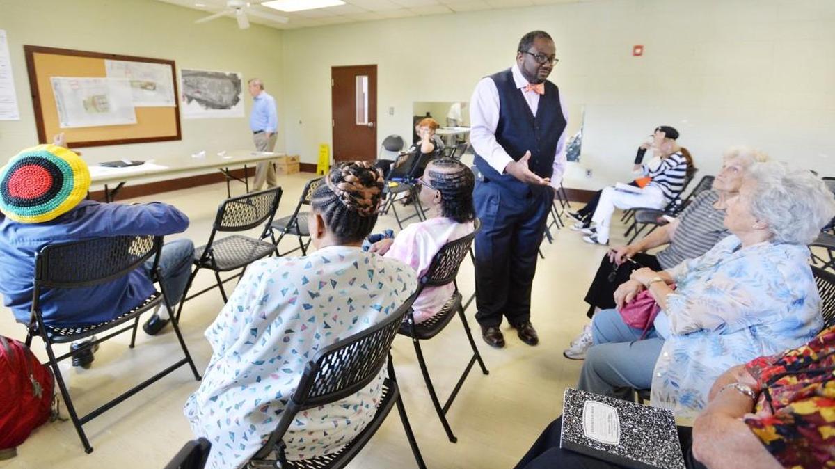 Macon-Bibb County Parks and Recreation Director Reggie Moore explains differences between two sites proposed for a new senior center in this Sept. 23, 2015, file photo.