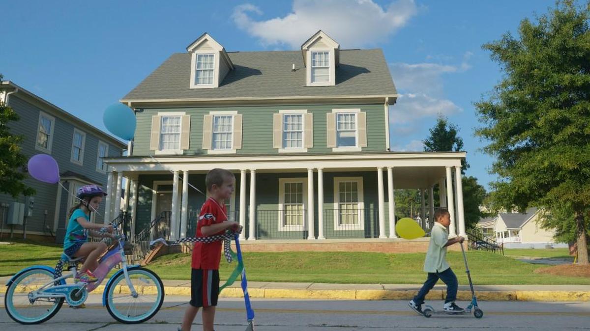 Children part of a bicycle parade roll through the Beall's Hill Neighborhood of Macon in 2014. A public hearing will be held Nov. 29, 2016 on a 20-year plan that outlines housing, transportation and economic development goals for Macon-Bibb County.