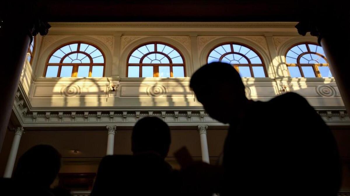 The setting sun shines through windows in the Georgia State Capitol in this 2013 file photo.