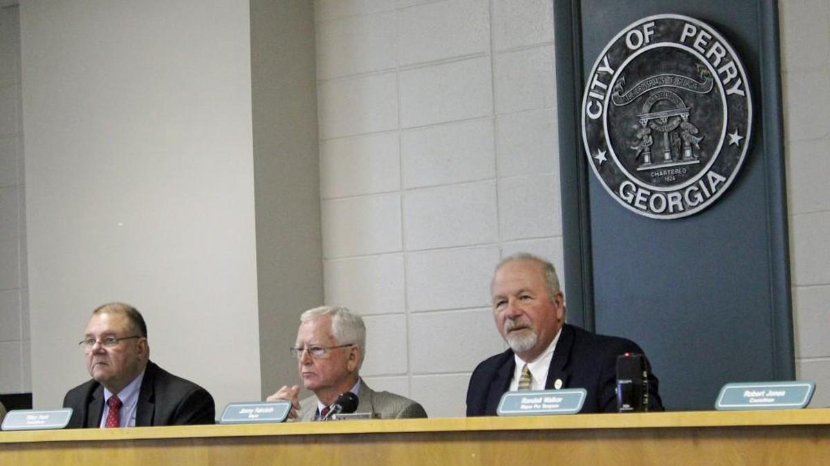 Perry Mayor Jimmy Faircloth, right, speaks during a City Council meeting Nov. 1.