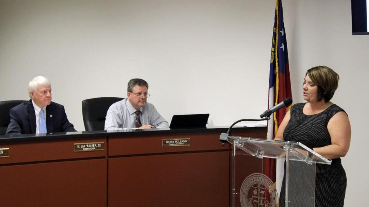 Amber Schmidtke asks the Houston County Commission to consider adopting a parental leave policy.