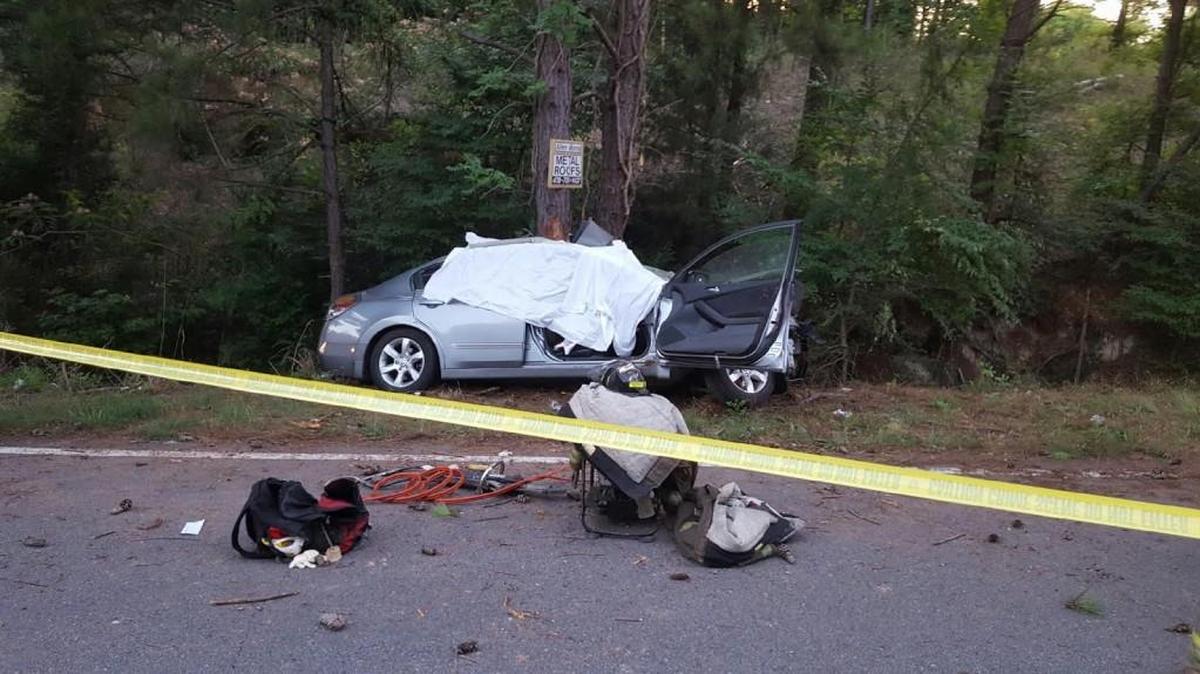 A man died after crashing his car into a tree on Ocmulgee East Boulevard in Macon.