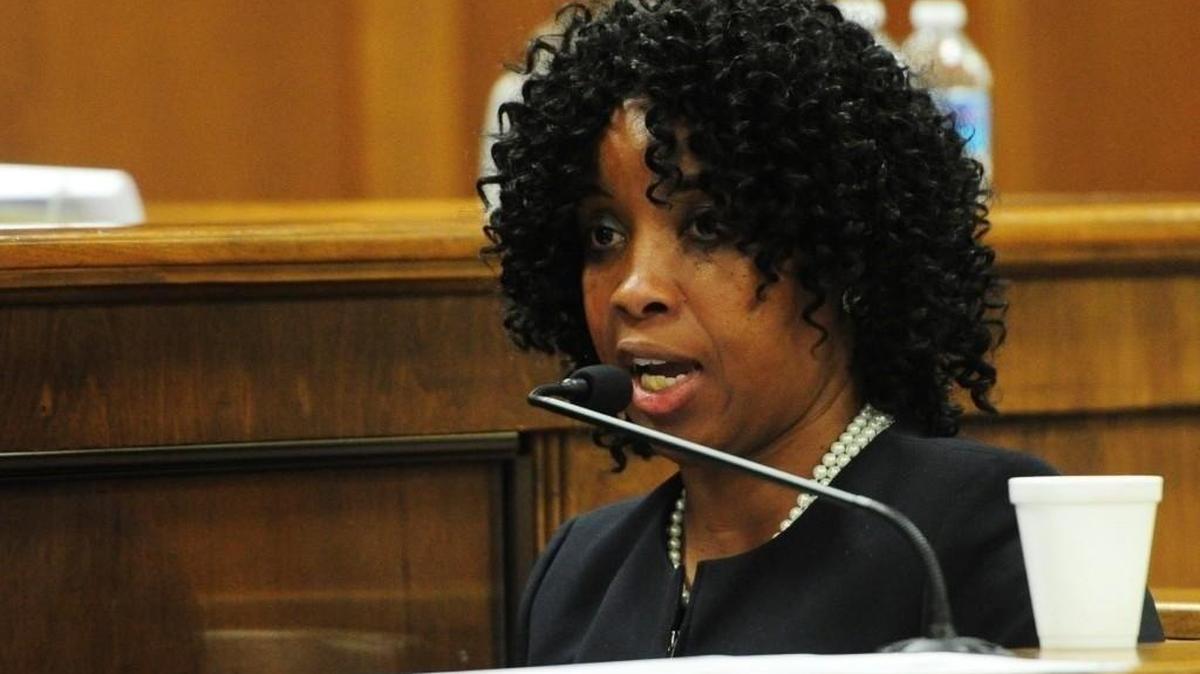 Veronica Brinson testifies at a 2014 hearing in which she was accused of contempt of court.
