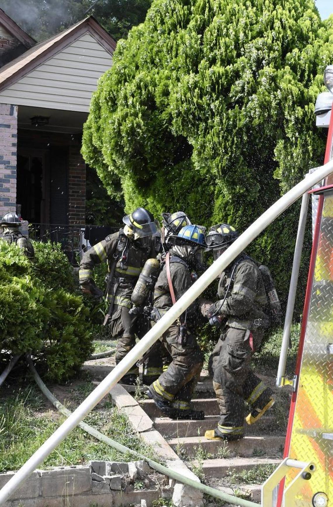 Macon-Bibb County firefighters rescued Eddie Jacobs from a blazing house at 2511 Montpelier Ave. May 19.