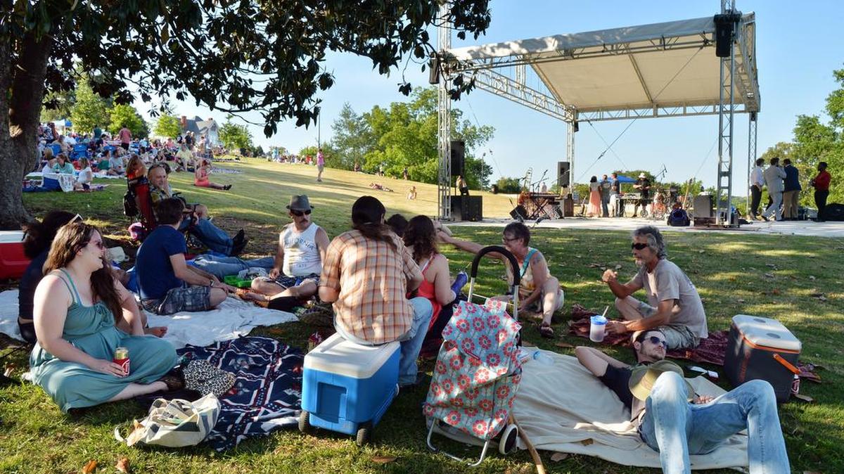 A group calling itself “The Macon Porch Party” left their porches behind but brought everything else required for a good picnic to Coleman Hill.