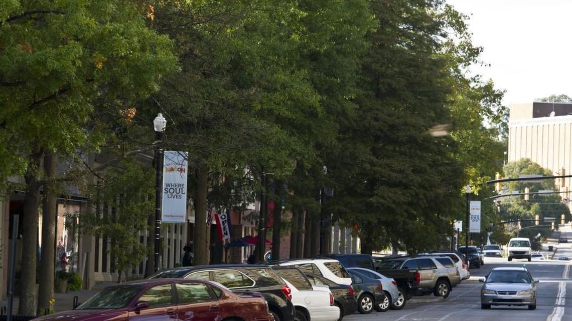 Vehicles are parked along Cherry Street between Third Street and Second Street on Oct. 26, 2016.