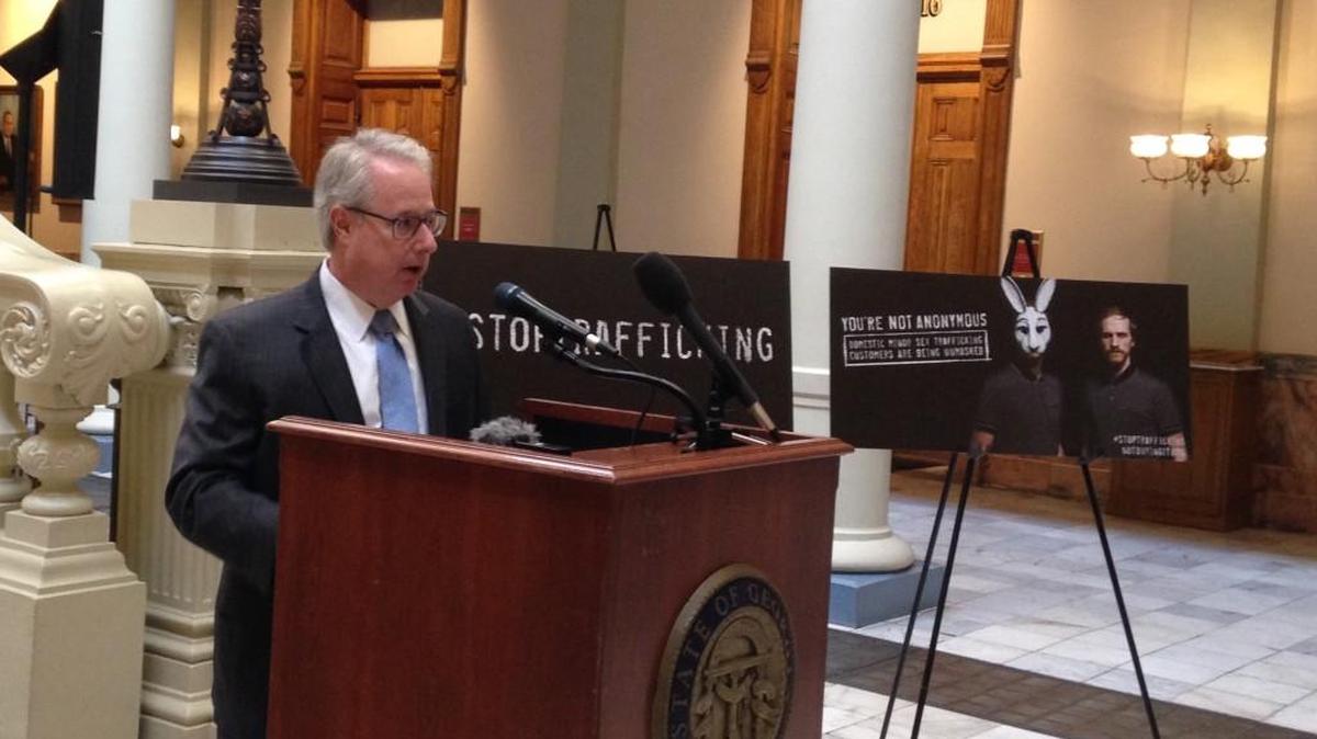 At the Georgia state Capitol on Tuesday, state Attorney General Sam Olens announces a new campaign that targets people who want to buy children for sex.