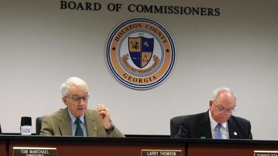 Houston County Commissioner Larry Thomson, left, talks about the need for more jailers at Tuesday's commission meeting as Chiarman Tommy Stalnaker listens.