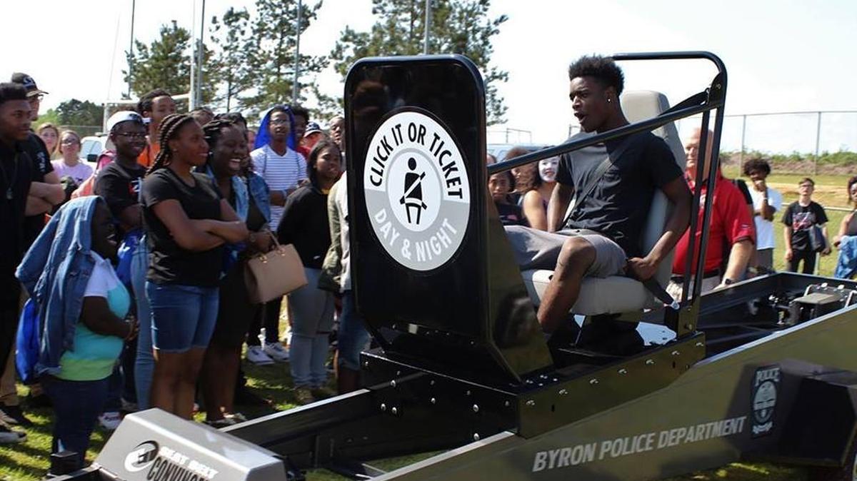Byron police were out in April at Jefferson County and Burke County high schools helping teach kids traffic safety. In this Byron police Facebook photo, this student learns why it’s important to wear a safety belt. About 60 percent of teen drivers killed in a crash in 2015 were not wearing a safety belt, AAA reports.