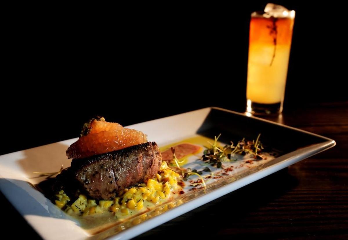 The veal tenderloin with dill cream corn, grapefruit, whole grain and micro mustards from Dovetail in Macon.