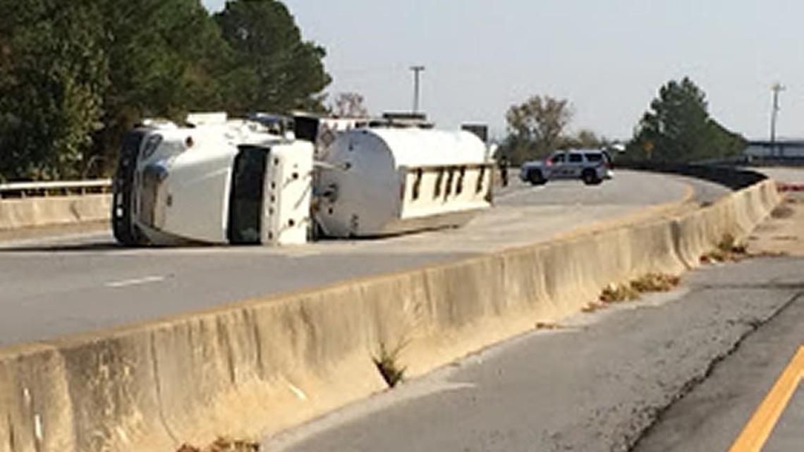 A fuel tanker overturned just before 11:30 a.m. on Nov. 14, 2016 in the westbound lanes of Russell Parkway coming from Ga. 247.