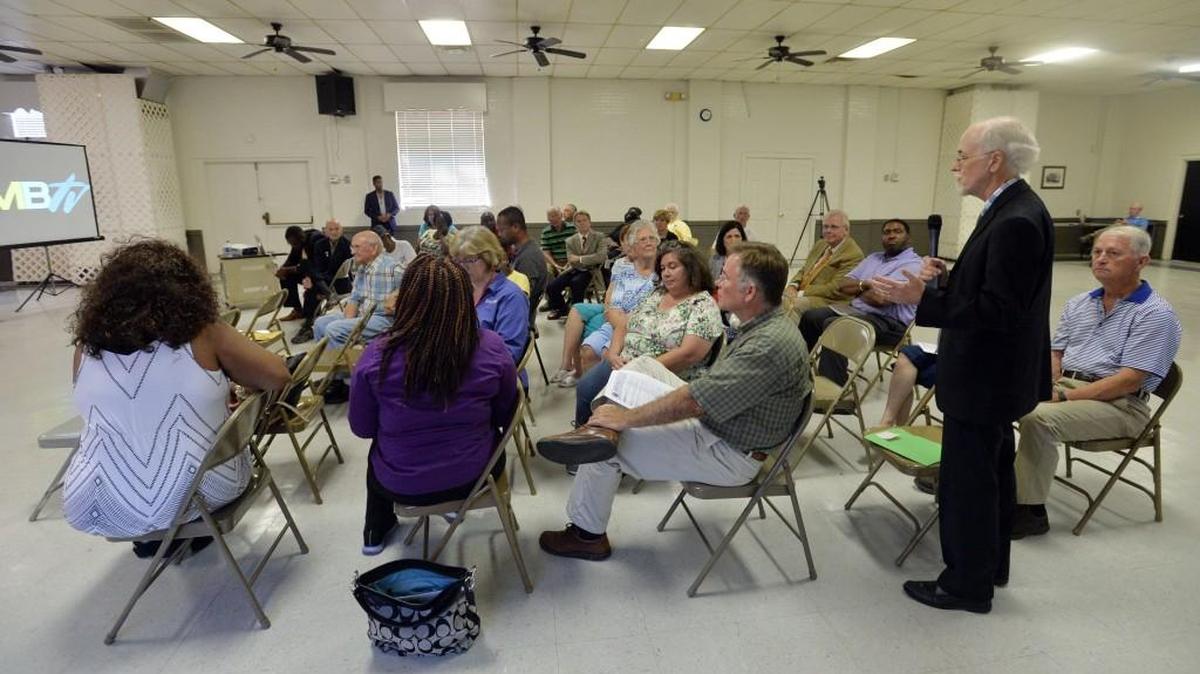 Tubman Museum director Andy Ambrose, right, thanked those at a meeting at the Porter-Ellis Community Center in south Bibb County for previously funding the museum and offered a project funding a special projects that would build out another 3,000 square feet that would provide groups with a performing arts venue.