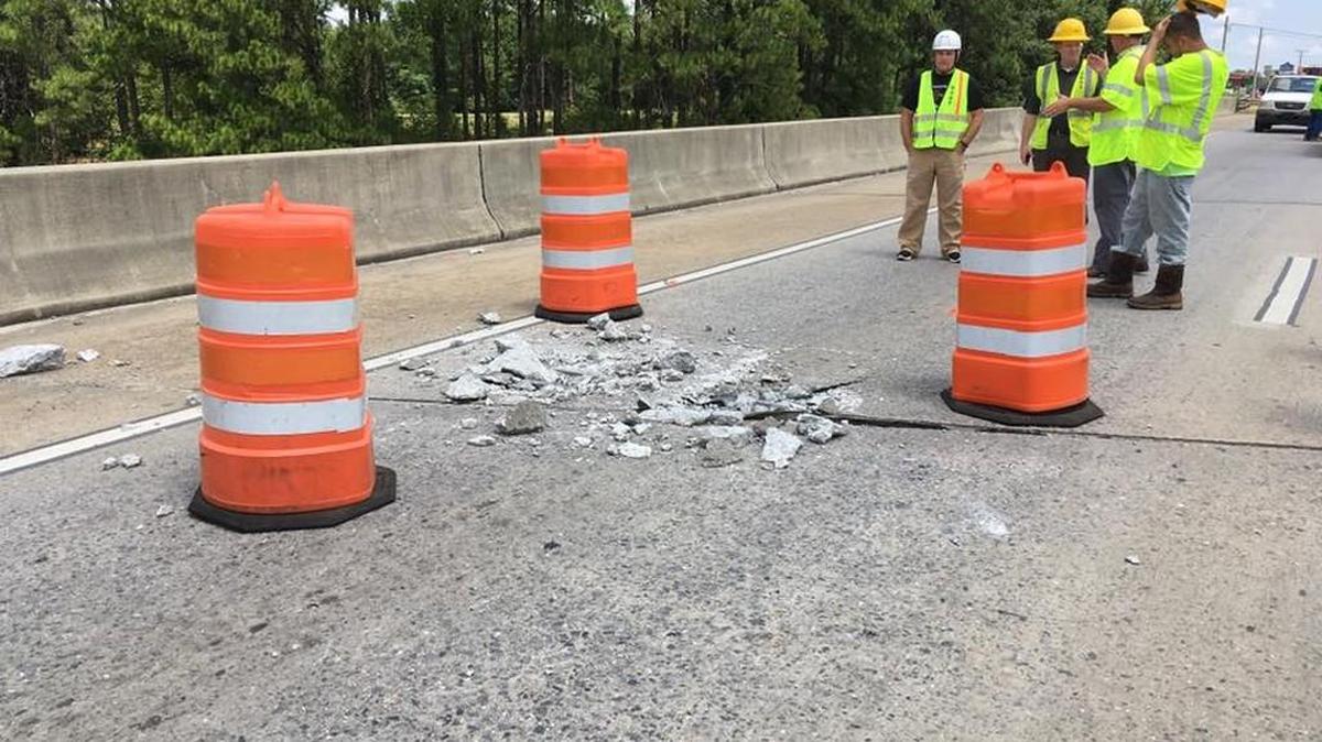 Interstate 16 was shut down Monday, July 24, 2017, after a tractor trailer hauling equipment smashed into the overpass at U.S. 441.
