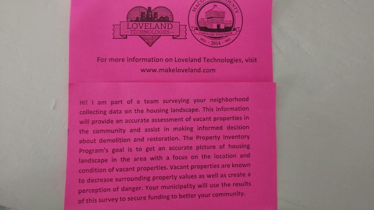 Loveland Technologies surveyors should be wearing a bright green vest and carrying this hot pink card.