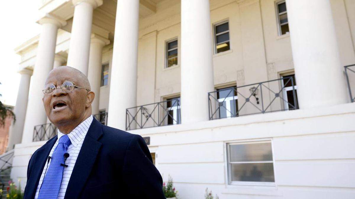 Former Bibb County Commissioner Lonzy Edwards speaks to the media in front of the Macon-Bibb County Government Center during a news conference Thursday afternoon. Edwards is running for mayor against Robert Reichert in the May 24 election.