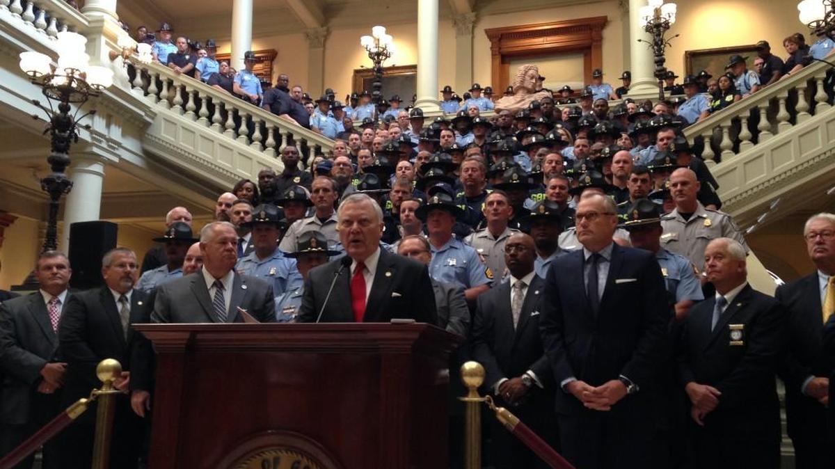 Georgia Republican Gov. Nathan Deal announced at the state Capitol on Thursday a plan to give 20 percent raises to law enforcement officers who work for state agencies, and to offer more training to all officers in Georgia. He said they have a job that is getting more difficult.