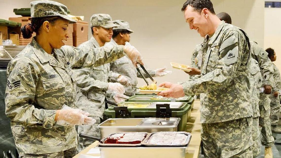 Air National Guardsmen with the Joint STARS 116th Force Support Squadron at Robins Air Force Base serve dinner to Army National Guard soldiers during the 2013 presidential inauguration. J-STARS airmen are headed to Washington again to support the inauguration of Donald Trump on Friday.