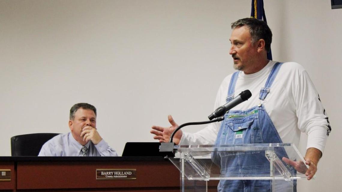 Howard Davidson makes a plea to the Houston County Commission on Tuesday to deny a rezoning that would have allowed apartments on Davidson Road in Bonaire.