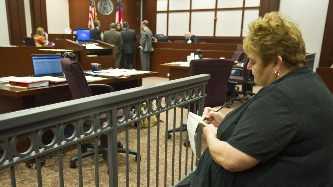 Telegraph reporter Becky Purser takes notes during a Houston County Superior Court trial Wednesday.