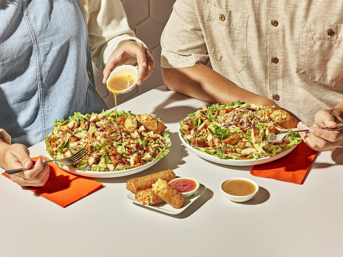 Zaxbys customers can top the Asian Zensation Zalad with their choice of fried chicken fingers or grilled chicken.