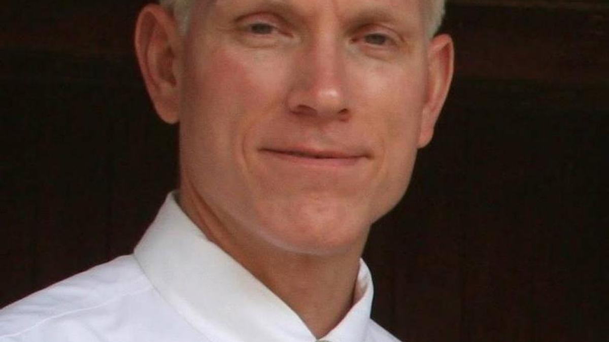 G.E. “Bo” Adams