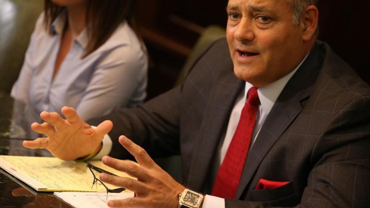 Attorney Carlos E. Silva addresses reporters’ questions during a press conference at the Silva & Silva law office in Coral Gables on Monday, July 17, 2017. Silva was banned by Twitter in the days following the Jan. 6 riot at the Capitol.